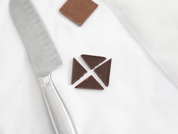 Cut each chocolate square into four even triangles.