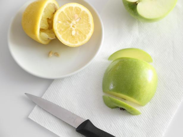 Cut each apple in half and core the centers. Cut the top and bottom of each apple off at a slight inward angle so the apple halves stand upright.