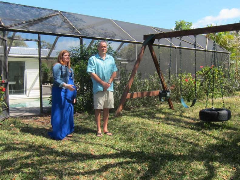 Buyers Bryan McCasland (R) and Candice McCasland (L) enjoy this beautiful playground at West Wind house, as seen on HGTV's Beachfront Bargain Hunt: Renovation.