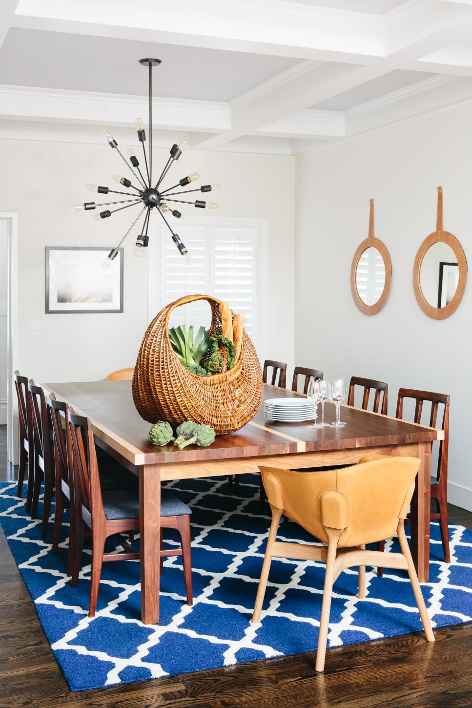 Bright Dining Room With Blue Patterned Rug, Large Dining Table and