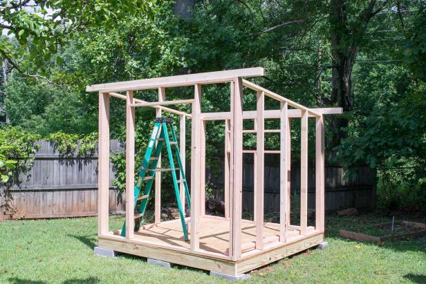 Make (2) roof supports by nailing (2)ten-foot 2x4’s double thick for each one. Use 3-inch exterior screws to attach the roof supports over the front and rear walls by screwing up through the wall plate from below.