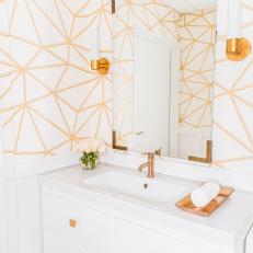 Midcentury Wallpaper and Mirror Create an Elegant Bathroom at this Chic Boutique Salon