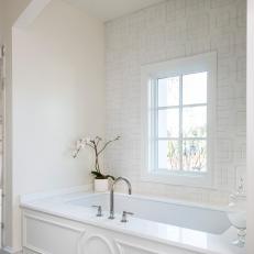 White Master Bathroom With Geometric Pattern