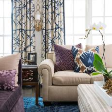 Family Room With Blue Patterned Curtains