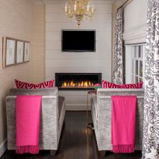 Small Media Room With Gold Chandelier