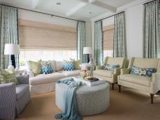 Blue Transitional Sitting Room With Striped Pillows