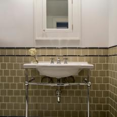Bathroom Sink and Brown Tile Backsplash