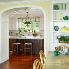 Yellow French Country Kitchen With Arch