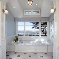 White Master Bathroom With Water View