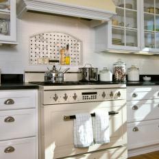 Oven Vignette in Tudor Kitchen Creates a Focal Point for the Space