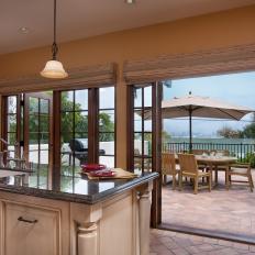 Open Plan Kitchen Offers Access to Patio and Views