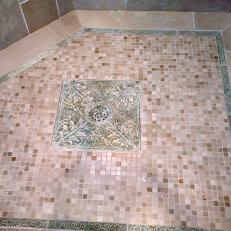 Small Tile Shower Floor Design With Neutral Tones and Decorative Drain Frame Tile 