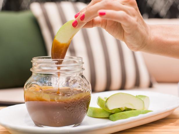 Dipping Apple Slice in Homemade Caramel Dip