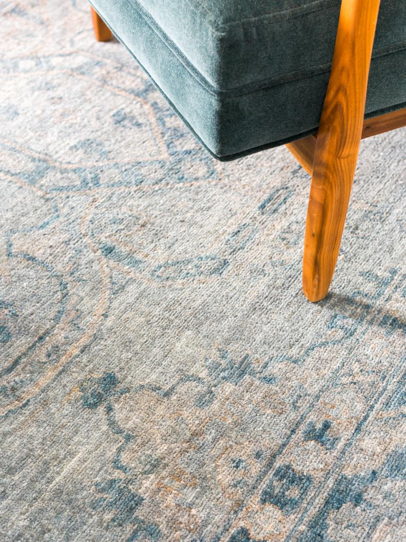 Patterned Area Rug Under Blue Chair