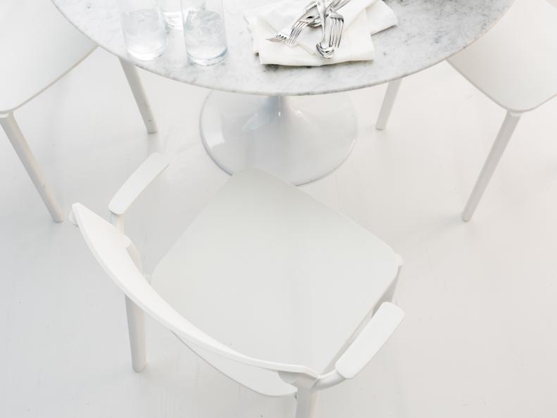 Round Marble Pedestal Table on White Floor