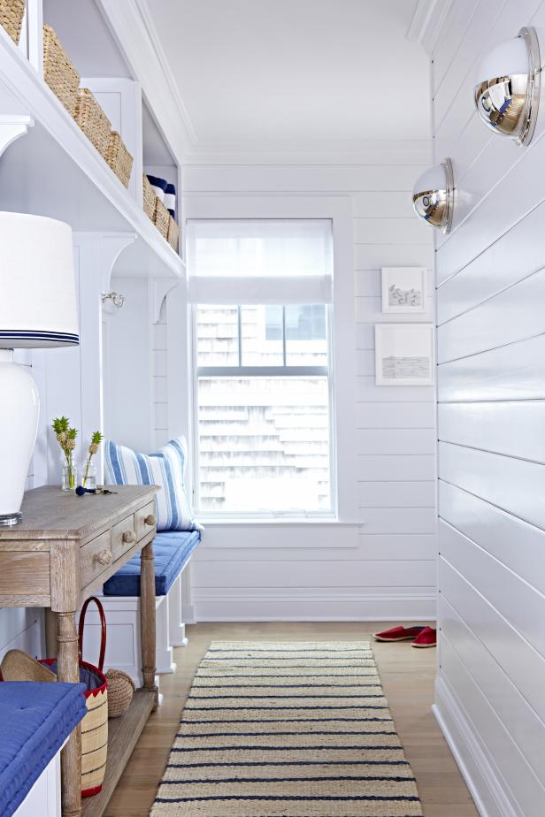 White Coastal Mudroom With Blue Accents