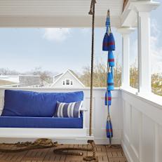 Beach Bungalow Porch With Cushioned Swing