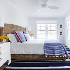 Guest Room With Pops of Navy Blue, Red and Yellow