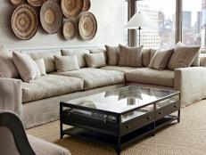 Sectional Sofa in Living Room with Woven Basket Wall Art