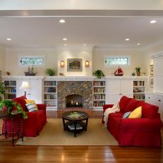 Classic, Comfortable Living Room With Cobblestone Fireplace