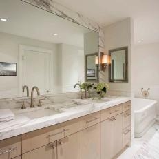Master Bathroom with Sycamore Cabinets and Dramatic Marble Accents