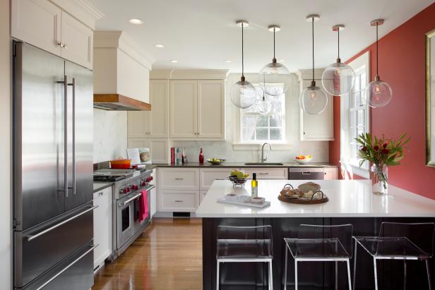 Modern Kitchen with Red Accent Wall and Modern Details | HGTV