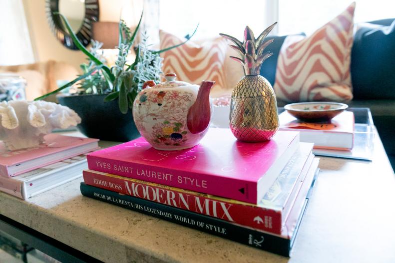 Pink and Pineapple Accessories on Coffee Table Decorated with Eclectic Items