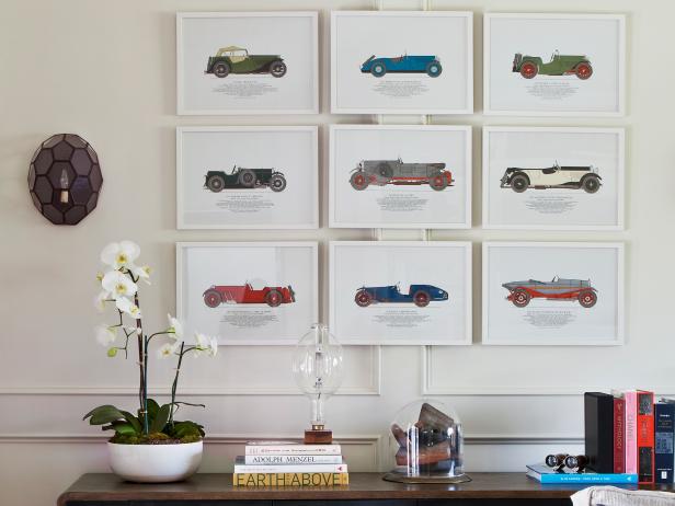 White Frames on Wall With Multicolor Antique Cars