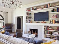 White Transitional Living Room With White Built-in Shelves