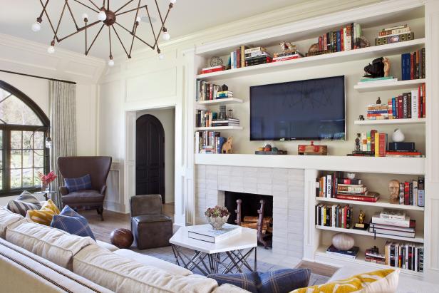 White Transitional Living Room With White Built-in Shelves