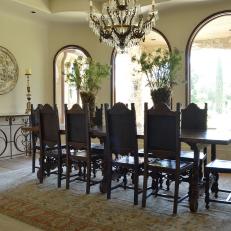 Mediterranean Dining Room With Arched Windows