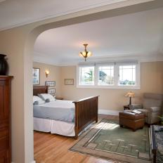 Neutral Craftsman Master Bedroom With Green Rug