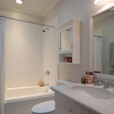 White Bathroom With Marble Countertop