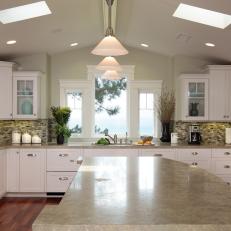 White Kitchen With Mosaic Tile Backsplash