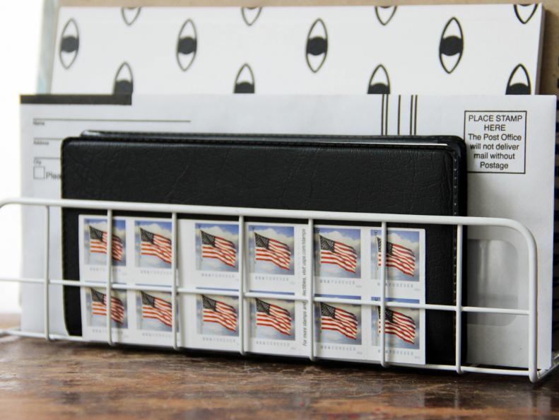 Keep your bills, checkbook and stamps together to stay organized.