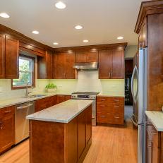 Wood Cabinets & Island Add Warmth to Transitional Kitchen
