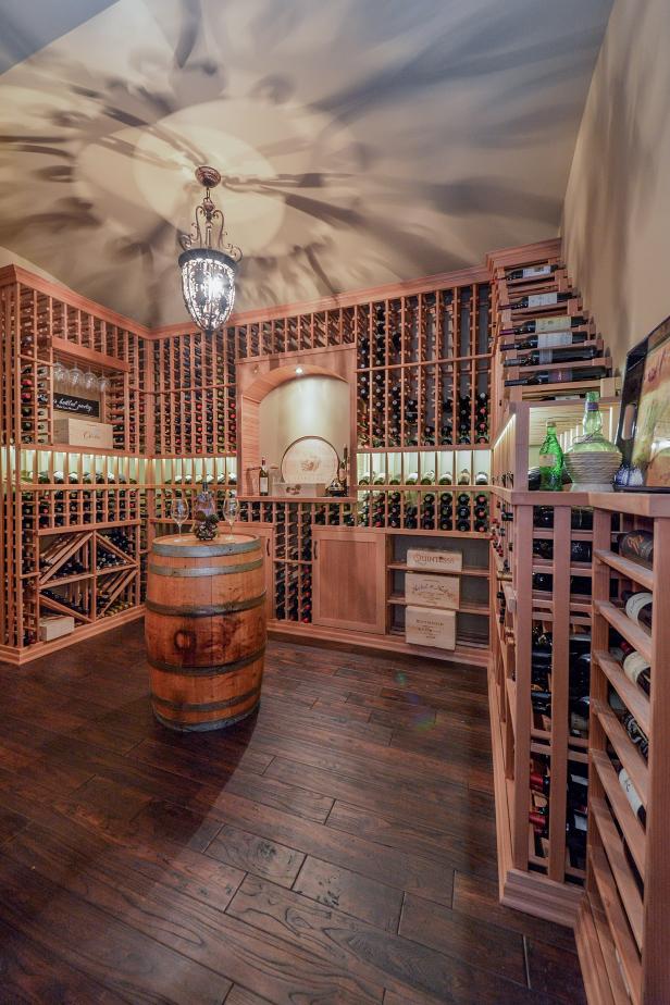 Large Floor To Ceiling Built In Wood Wine Rack In Neutral