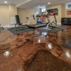 Brown Stone Flooring in Home Gym With Neutral Walls and Recessed Lighting 