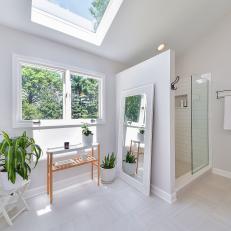 Skylight Brightening Monochromatic Contemporary Bathroom With Subway Tile Shower and Floor Full Length Mirror 