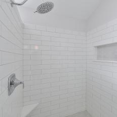 White Subway Tile Shower With Rain Shower Head, Built in Storage Cubby and Built in Corner Seat 