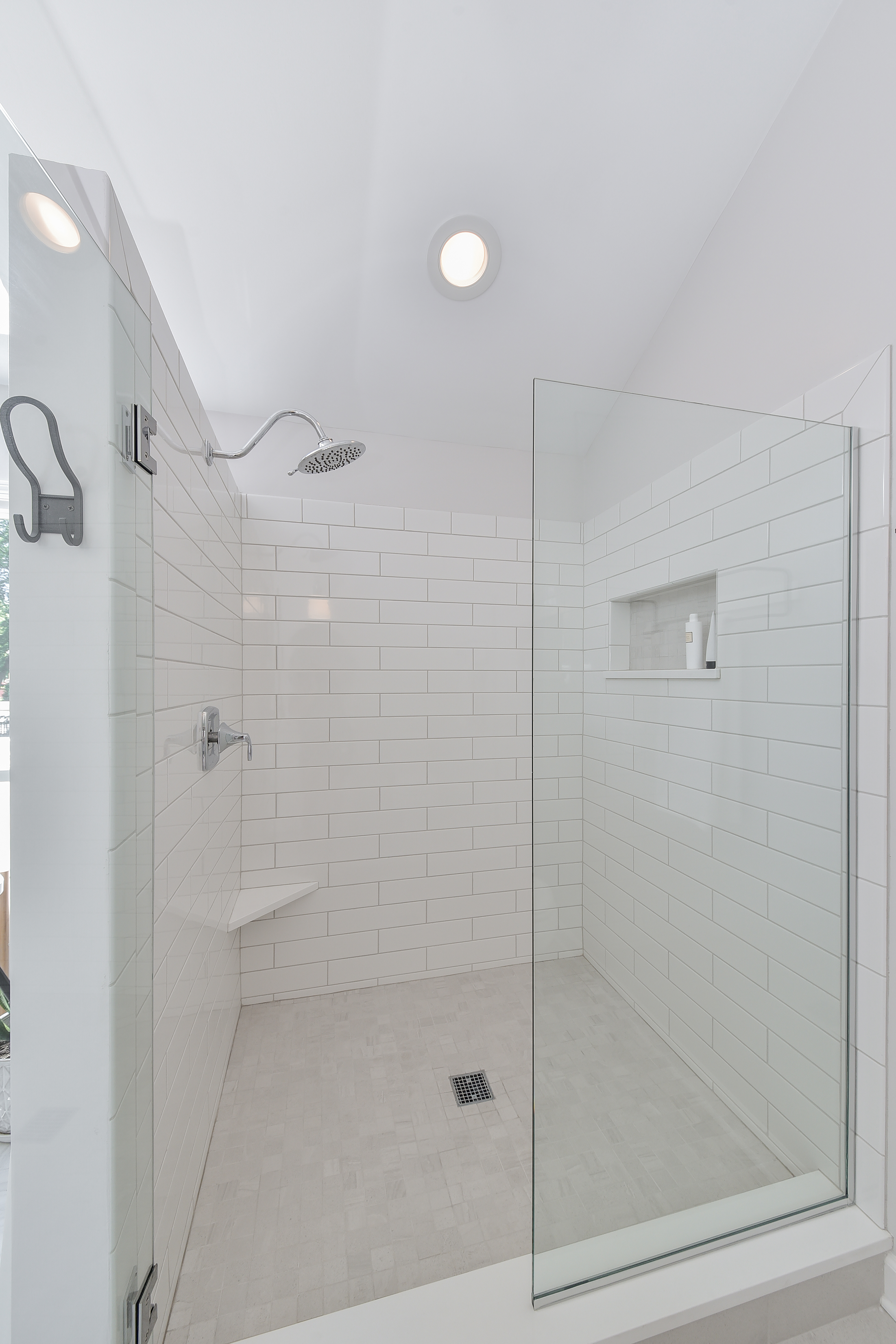 white tiled shower