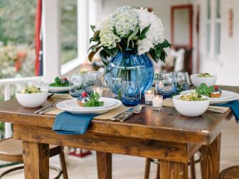 Wooded Outdoor Dining Table with Blue and White Accents