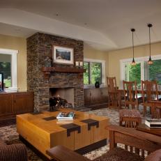 Open Plan Living and Dining Room With Stone Fireplace