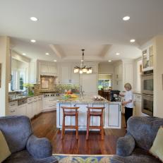 Open Plan Kitchen and Den With Armchairs
