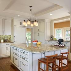 White Traditional Kitchen With Barstools
