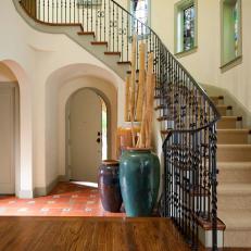 Staircase From Second Floor Leads Into Home's Foyer 