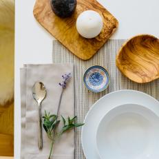 White Loft Kitchen Table with Wood Bowl and Cutting Board for Warmth 