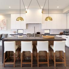 White Contemporary Open Plan Kitchen With Gold Pendants