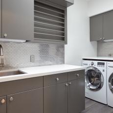 Gray Contemporary Laundry Room With Silver Backsplash