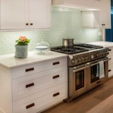 Stove and White Kitchen Cabinets